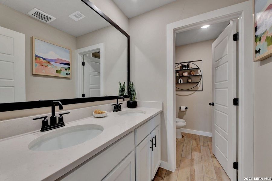Furnished interior view inside a new home in Veranda Designer, San Antonio (Image 8).
