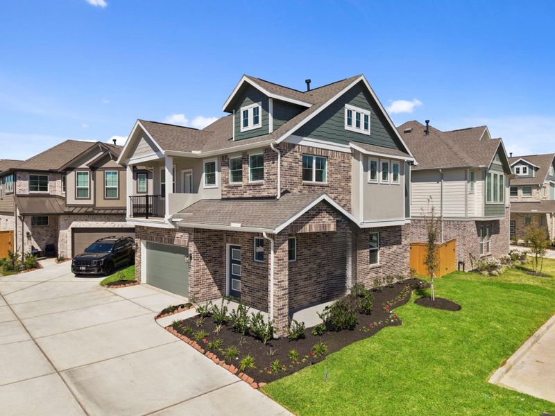 Front exterior of a new home in Balmoral, Humble, TX, highlighting curb appeal (Image 20).