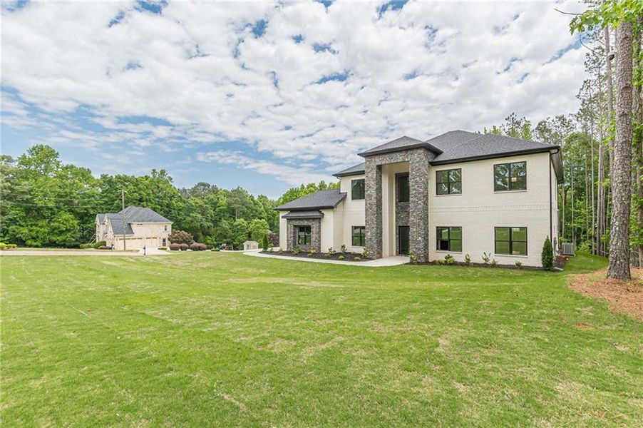 Exterior details and patio area of a home in , McDonough (Image 4).