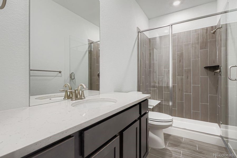 Furnished interior view inside a new home in Macanta: The Grand Collection, Castle Rock (Image 5).