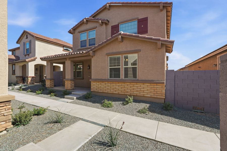 Front exterior of a new home in Parkside, Avondale, AZ, highlighting curb appeal (Image 24).