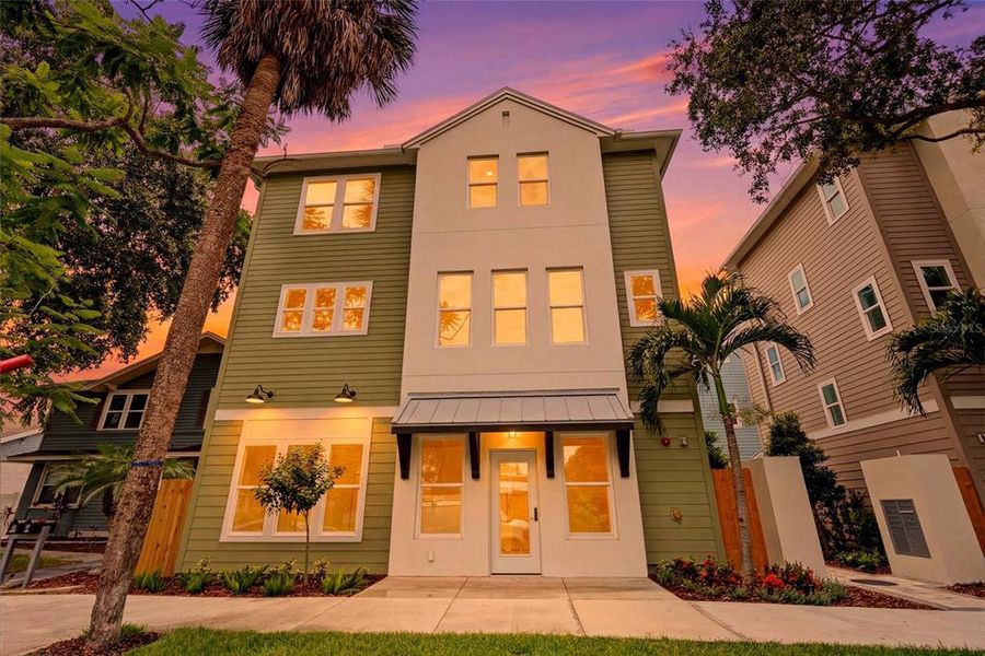 Front exterior of a new home in , St. Petersburg, FL, highlighting curb appeal (Image 27).