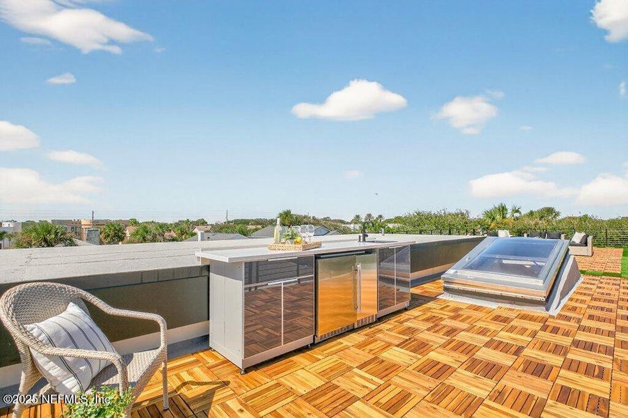 Exterior details and patio area of a home in , Neptune Beach (Image 59).