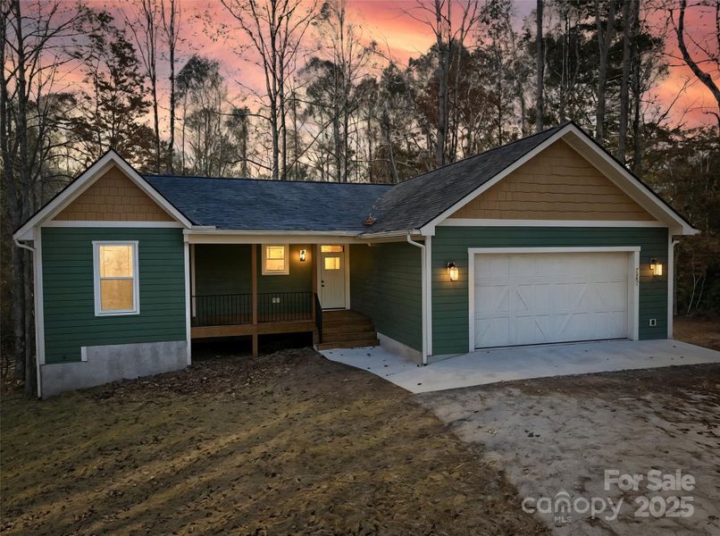 Front exterior of a new home in , Hendersonville, NC, highlighting curb appeal (Image 21).