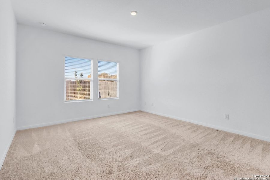 Spacious, unfurnished interior of a new home in Navarro Ranch: Classic Collection, Seguin (Image 16).