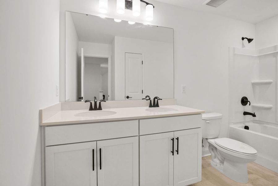 Furnished interior view inside a new home in Forest Creek, Waxhaw (Image 7).