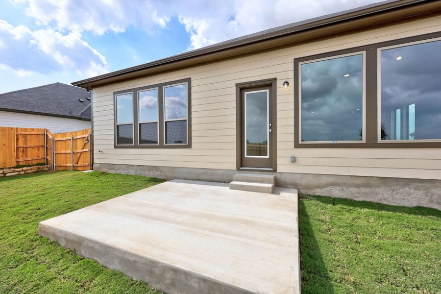 Exterior details and patio area of a home in Prairie Winds, Hutto (Image 4).