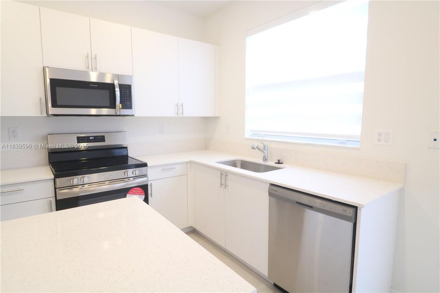 Furnished interior view inside a new home in , Homestead (Image 6). Furnished interior view inside a new home in , Homestead (Image 6).