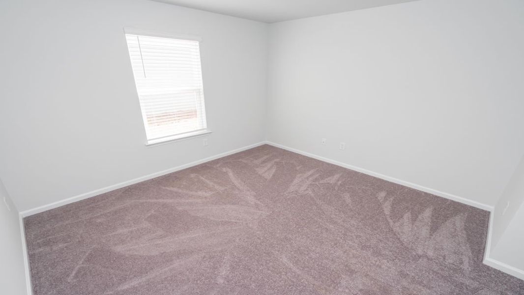Representative unfurnished interior of a home built from the Cali by D.R. Horton in Jordanville Farms, Galivants Ferry (Image 22).