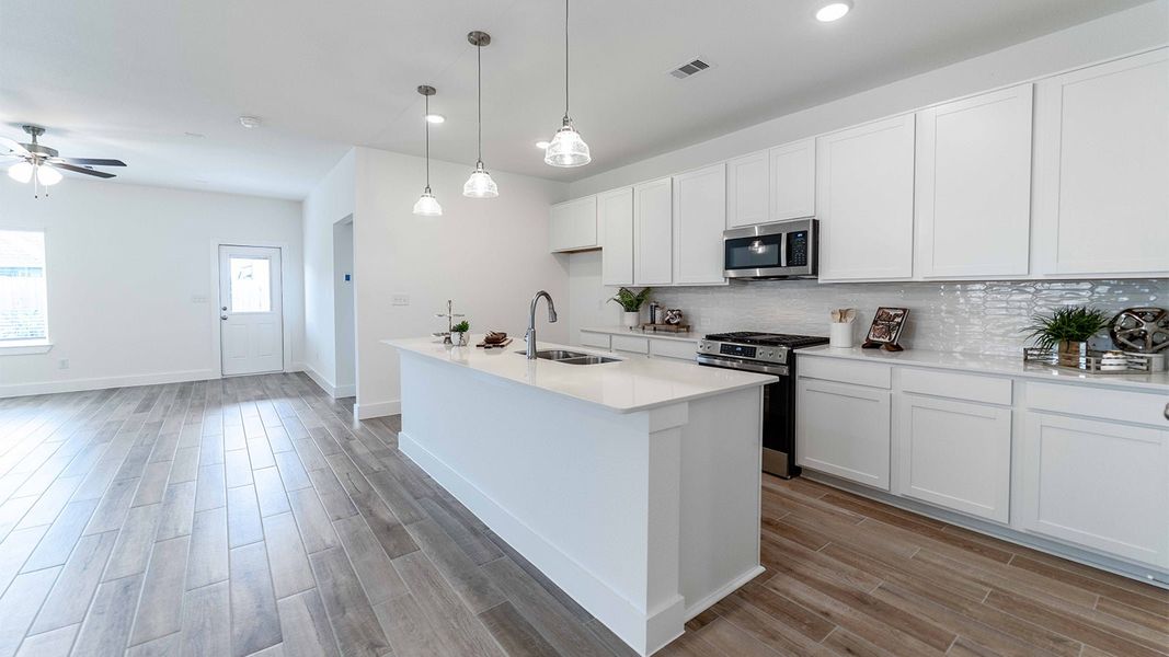 Furnished interior view inside a new home in Massey Oaks, Pearland (Image 6). Furnished interior view inside a new home in Massey Oaks, Pearland (Image 6).