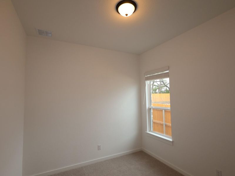Spacious, unfurnished interior of a new home in Heritage, Dripping Springs (Image 9).