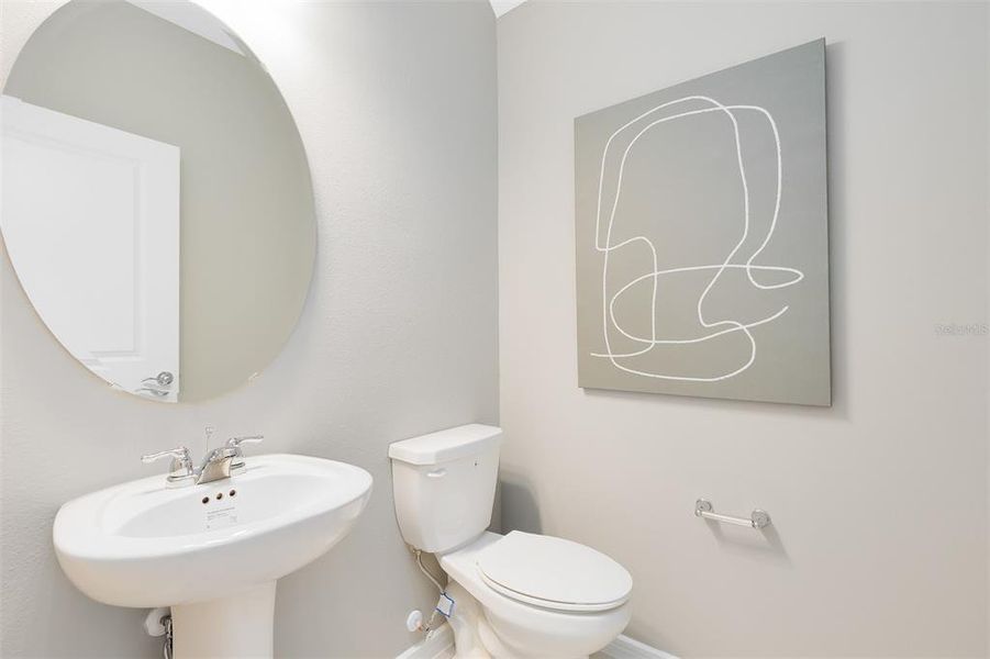 Furnished interior view inside a new home in Tohoqua, Kissimmee (Image 11).