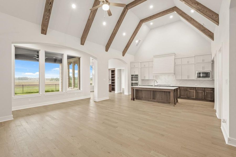 Family Room with Vaulted Ceilings, Wood Beams & Natural Light