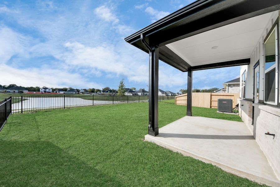 Exterior details and patio area of a home in Laurel Landing: Founders Collection, Alvin (Image 2).