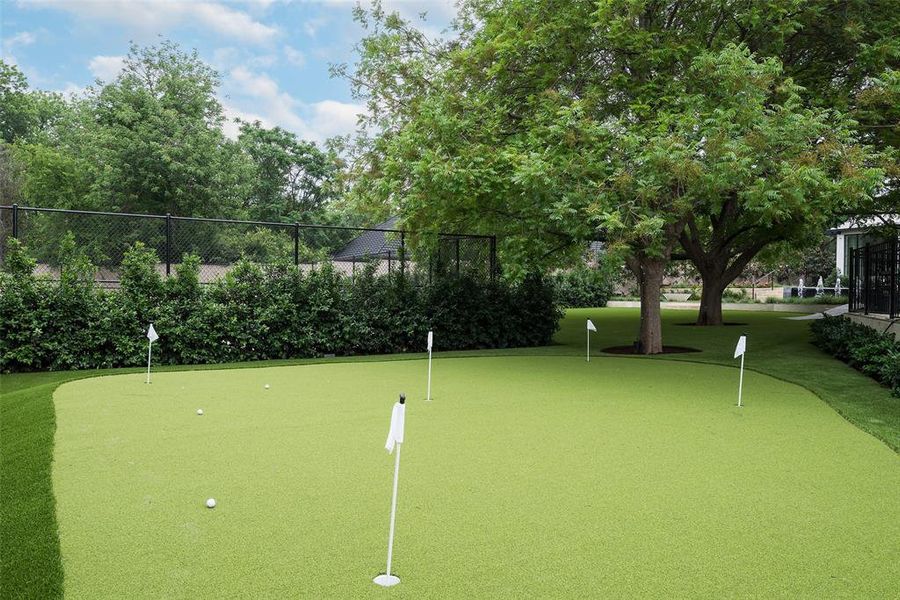 Putting green adjacent to pickleball/sport court