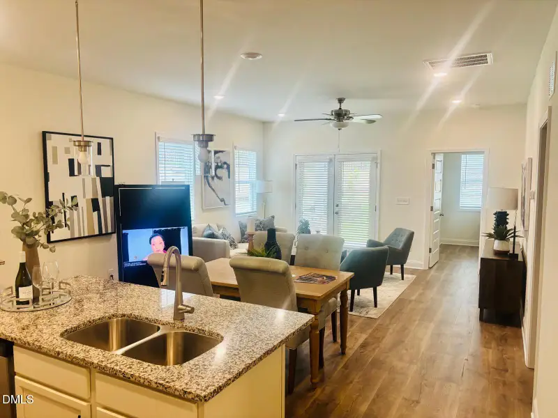 WOTH Model Staged Kitchen to living room