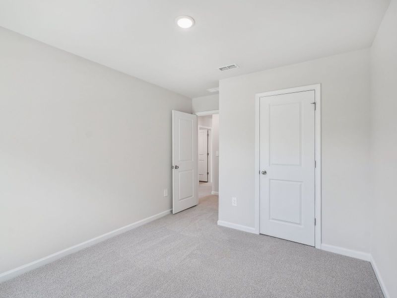 Spacious, unfurnished interior of a new home in The Rows at Buffaloe Reserve, Raleigh (Image 16). Spacious, unfurnished interior of a new home in The Rows at Buffaloe Reserve, Raleigh (Image 16).