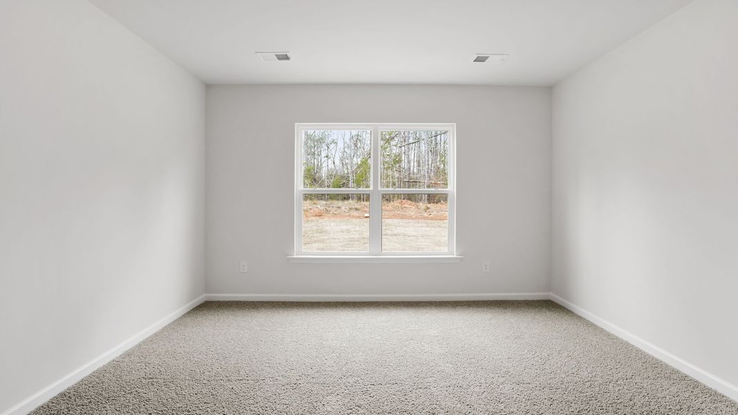 Spacious, unfurnished interior of a new home in Bentley Park, Greenwood (Image 23).