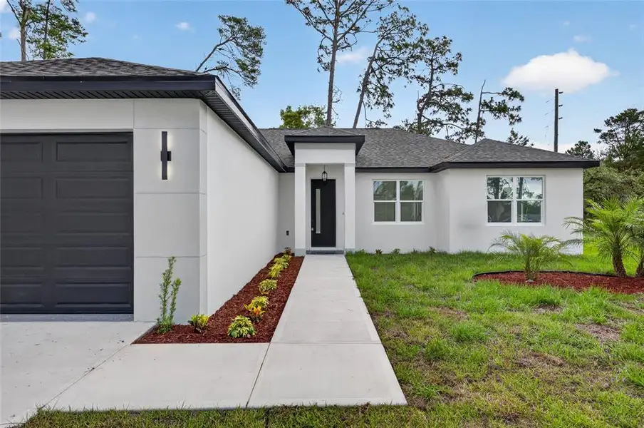 Exterior details and patio area of a home in , Spring Hill (Image 32).