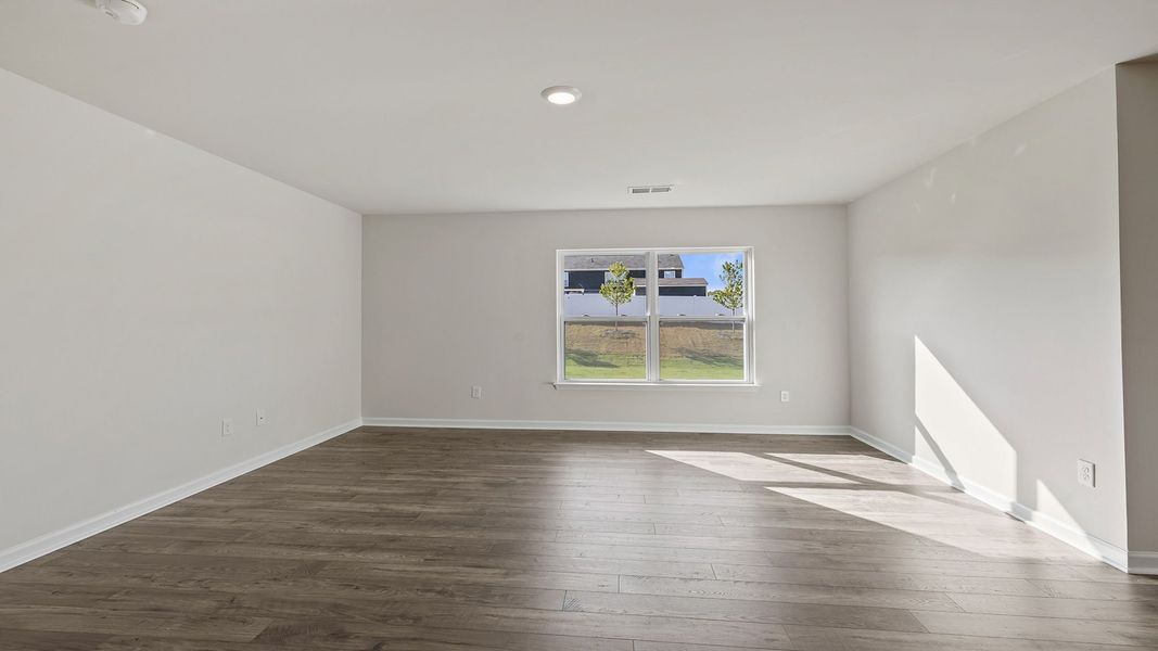Spacious, unfurnished interior of a new home in Bentley Park, Greenwood (Image 24).