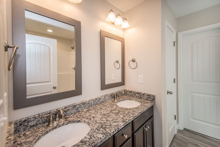 Representative furnished interior of a home built from the Quincy by Enchanted Homes in Lonesome Dove, San Antonio (Image 19).
