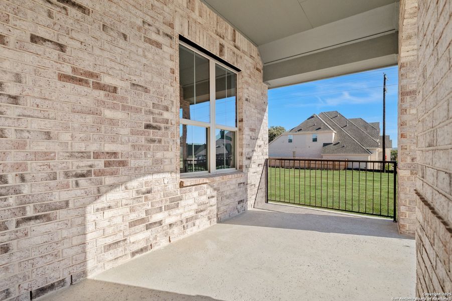 Exterior details and patio area of a home in Ventana, Bulverde (Image 3).