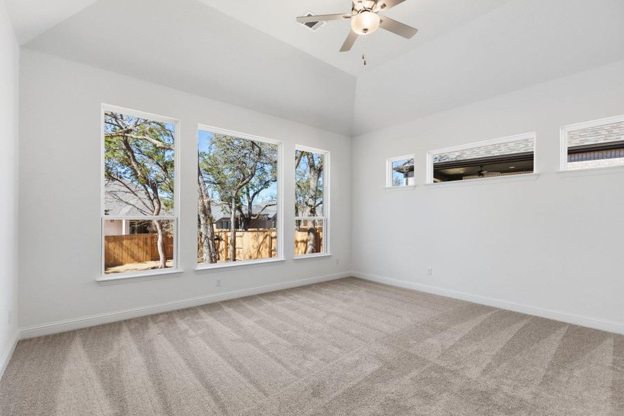 Primary Bedroom with elevated ceiling