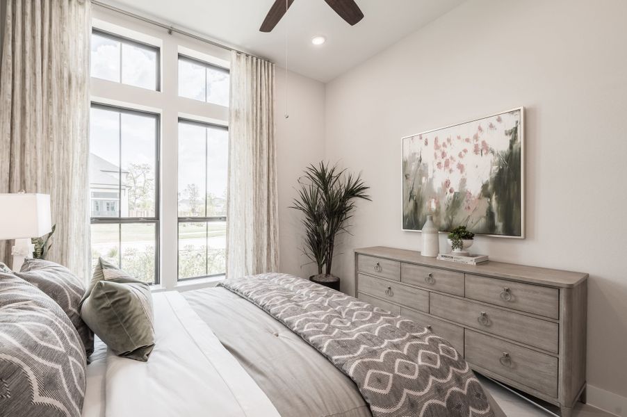 Representative furnished interior of a home built from the Carignan by Tri Pointe Homes in Dunham Pointe, Cypress (Image 7).