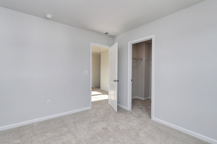 Spacious, unfurnished interior of a new home in Hainer Place, Conway (Image 34).