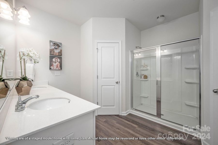 Primary bath with dual sinks and large shower