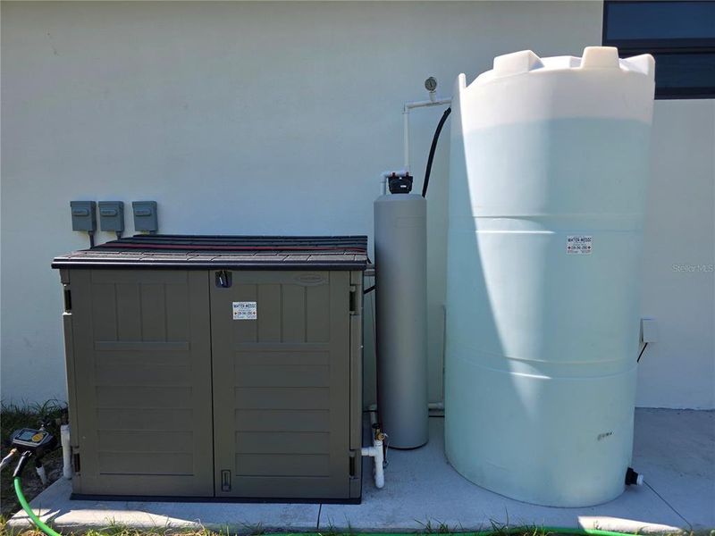 Exterior details and patio area of a home in , North Port (Image 38).
