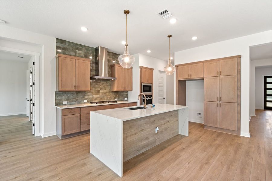 Furnished interior view inside a new home in Capitol Collection at Lariat, Liberty Hill (Image 7).