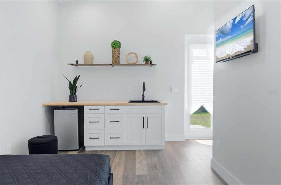 Furnished interior view inside a new home in , Port Charlotte (Image 14). Furnished interior view inside a new home in , Port Charlotte (Image 14).