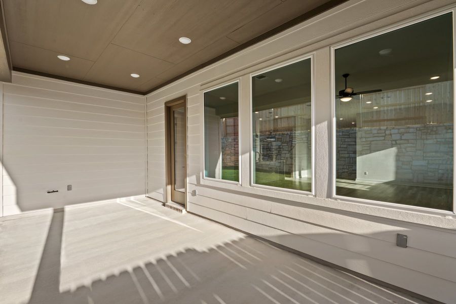 Exterior details and patio area of a home in Lariat, Liberty Hill (Image 4).