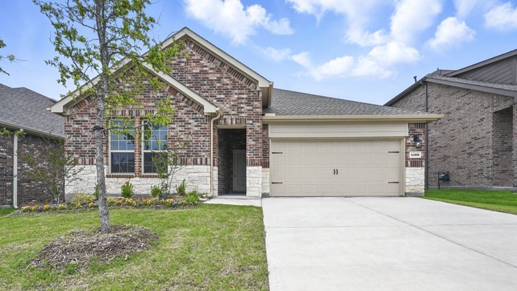 Representative exterior photo of a completed home built from the Vail by D.R. Horton in Lakewood Trails, Forney, TX (Image 2). Representative exterior photo of a completed home built from the Vail by D.R. Horton in Lakewood Trails, Forney, TX (Image 2).
