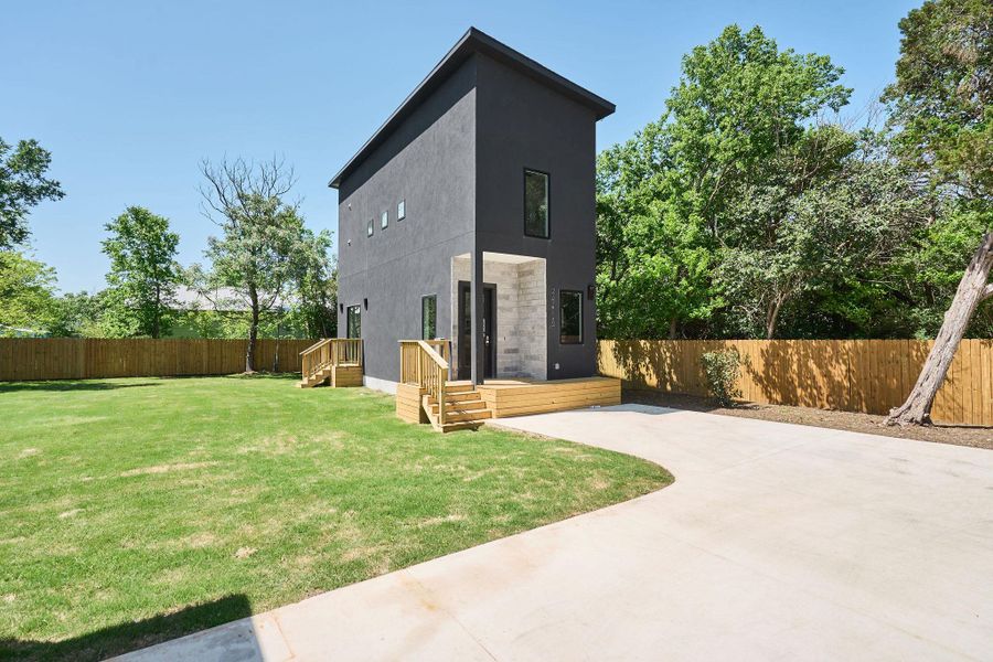 Front exterior of a new home in , Austin, TX, highlighting curb appeal (Image 14).