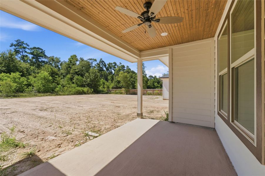 Exterior details and patio area of a home in , Huffman (Image 3). Exterior details and patio area of a home in , Huffman (Image 3).