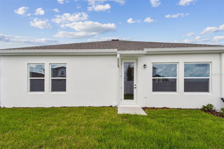 Exterior details and patio area of a home in The Peninsula at Rhodine Lake, Riverview (Image 20).