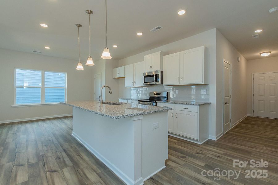 Furnished interior view inside a new home in Country Club Village, Salisbury (Image 13).