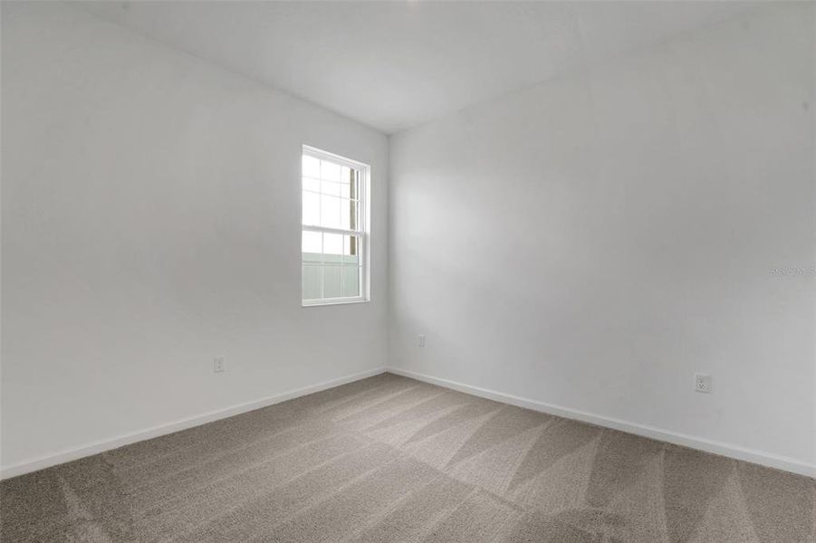 Spacious, unfurnished interior of a new home in Annabelle Estates, Winter Haven (Image 15).