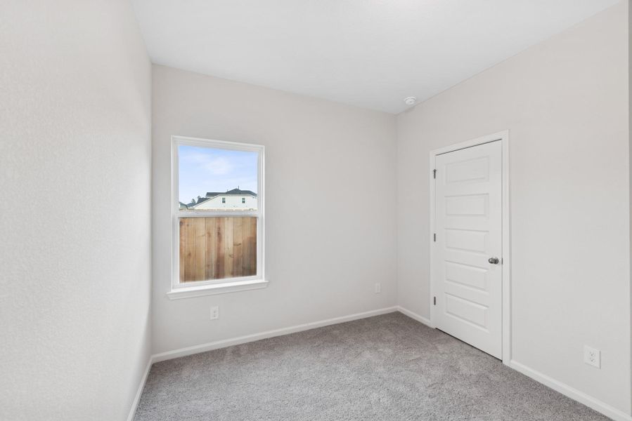 The Cardinal II- Bedroom 2. Photos of home shown are for illustration only; actual features, colors, and upgrades may vary.