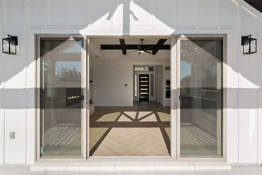 Property entrance with board and batten siding