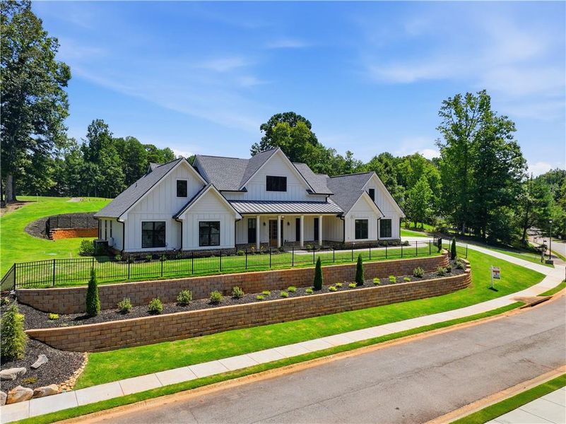 Front exterior of a new home in , Commerce, GA, highlighting curb appeal (Image 25). Front exterior of a new home in , Commerce, GA, highlighting curb appeal (Image 25).