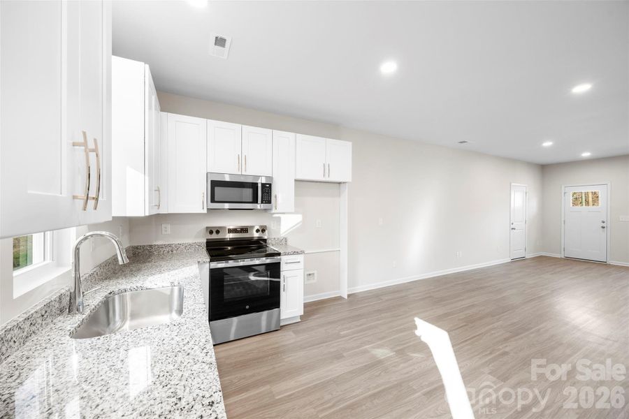 Furnished interior view inside a new home in , Bessemer City (Image 9).