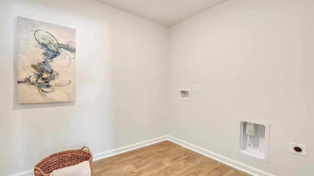 Representative unfurnished interior of a home built from the ROBIE by D.R. Horton in Longleaf Village, Rincon (Image 22).