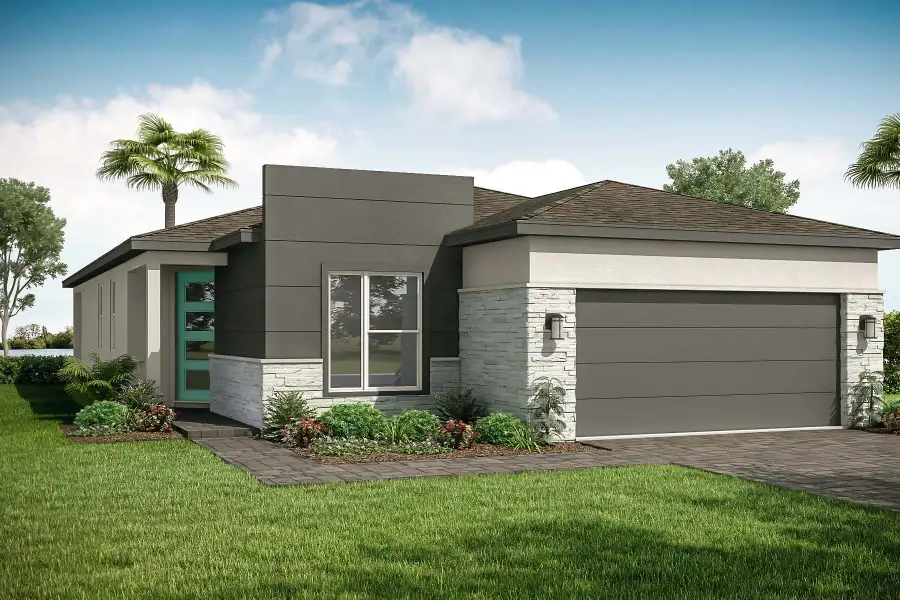 Front exterior of a new home in Tradition, Port St. Lucie, FL, highlighting curb appeal (Image 2).