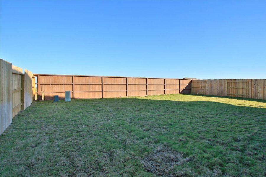 Exterior details and patio area of a home in Oakwood Estates, Waller (Image 21).