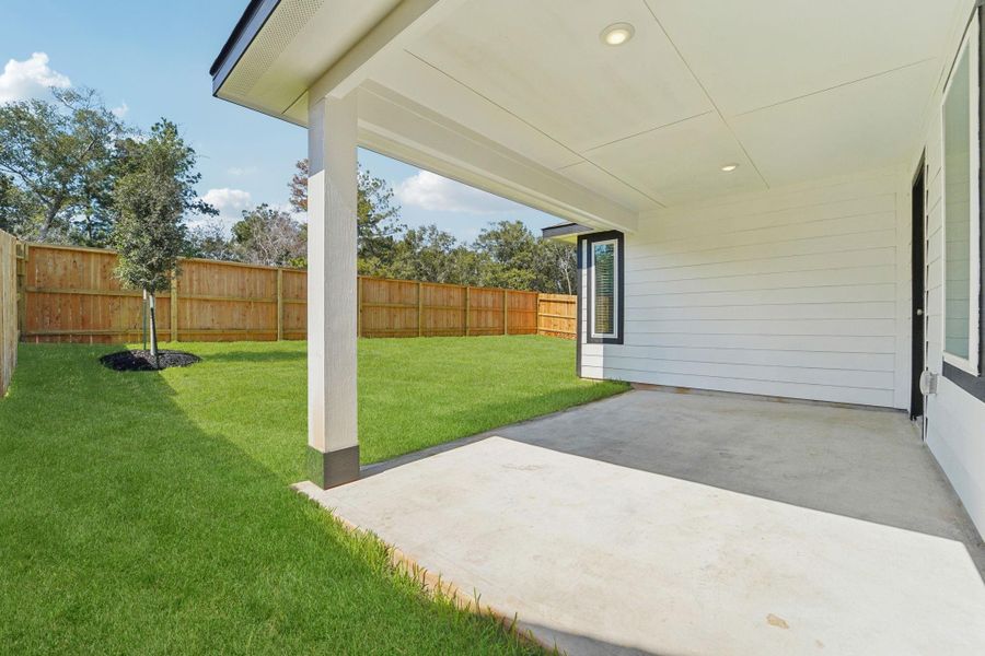 Exterior details and patio area of a home in Stewart's Ranch, Conroe (Image 28). Exterior details and patio area of a home in Stewart's Ranch, Conroe (Image 28).
