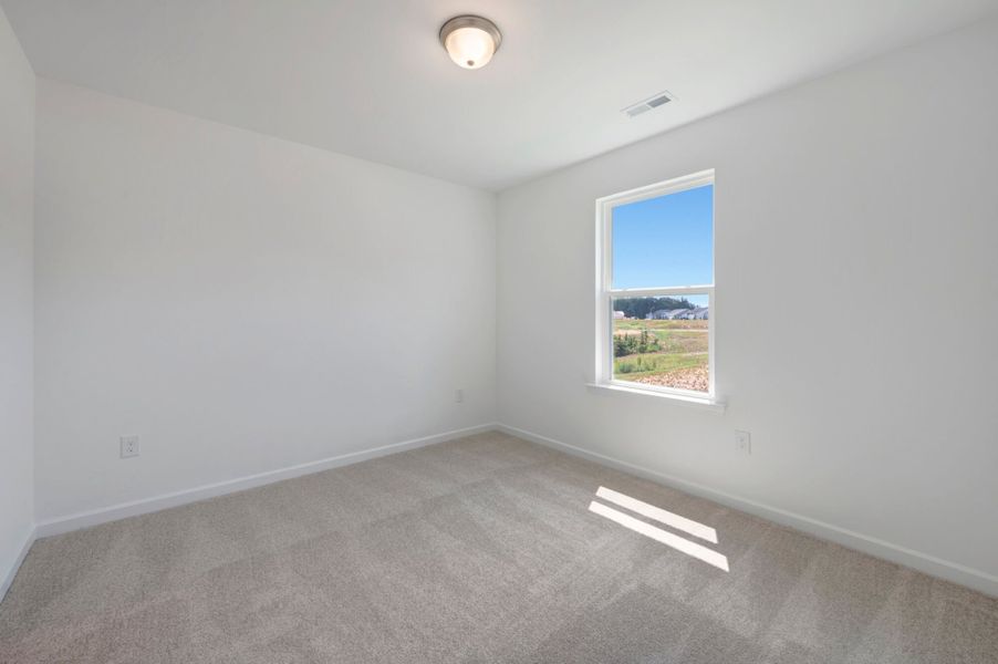 Spacious, unfurnished interior of a new home in Providence Creek, Fuquay Varina (Image 24).