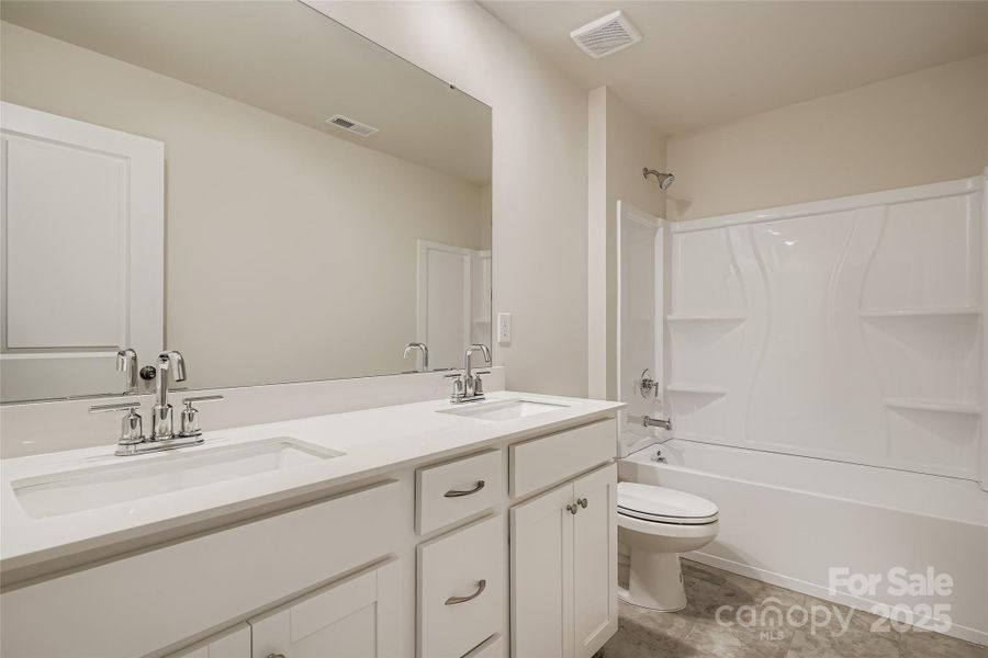 Furnished interior view inside a new home in Shannon Woods: Walk & Enclave, Maiden (Image 6).